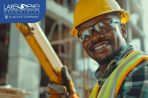 Construction worker smiling in-safety gear promoting cornea care-and eye protection