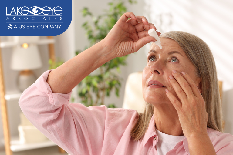 Woman using glaucoma drops in summer